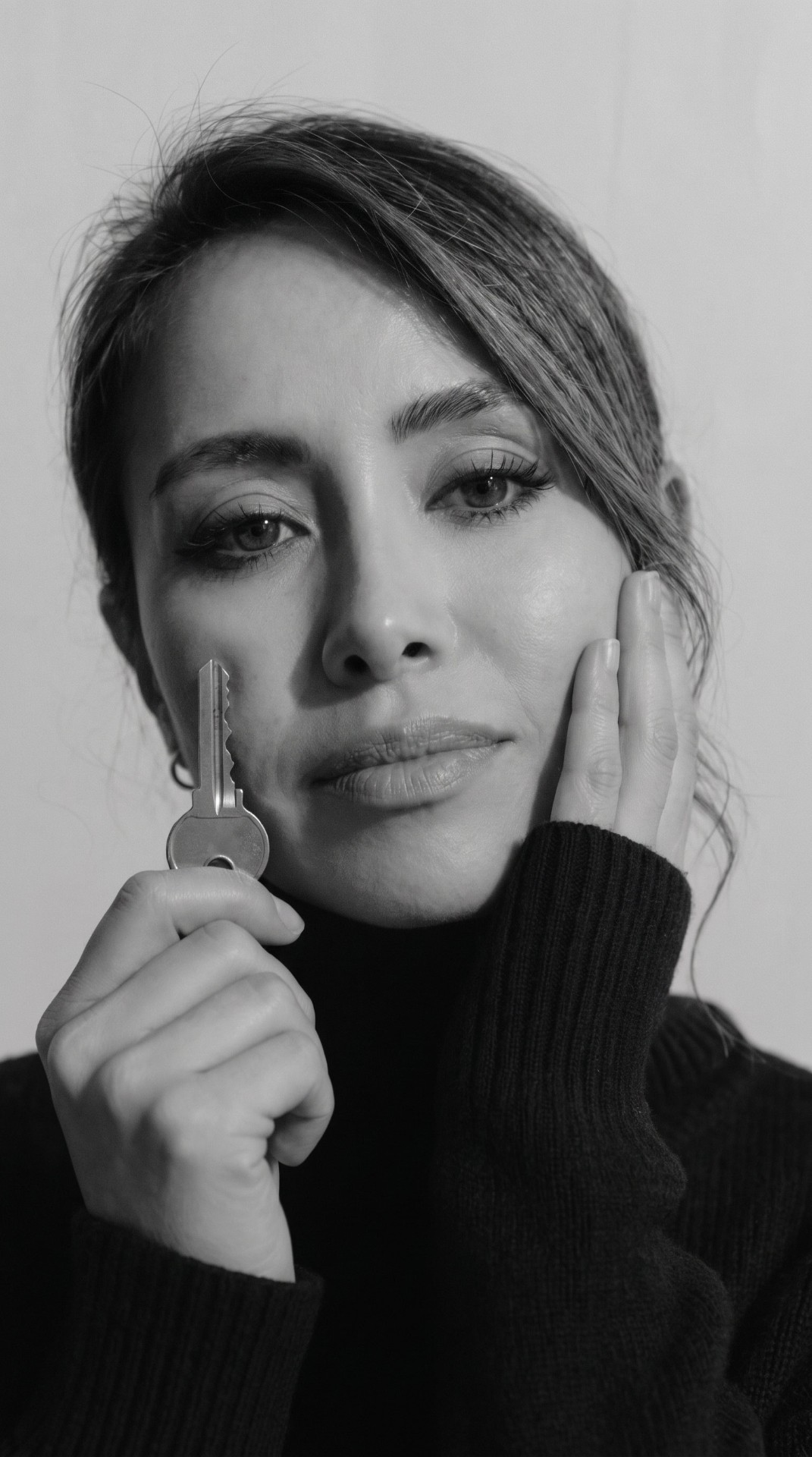 Juliana Valencia holding a key